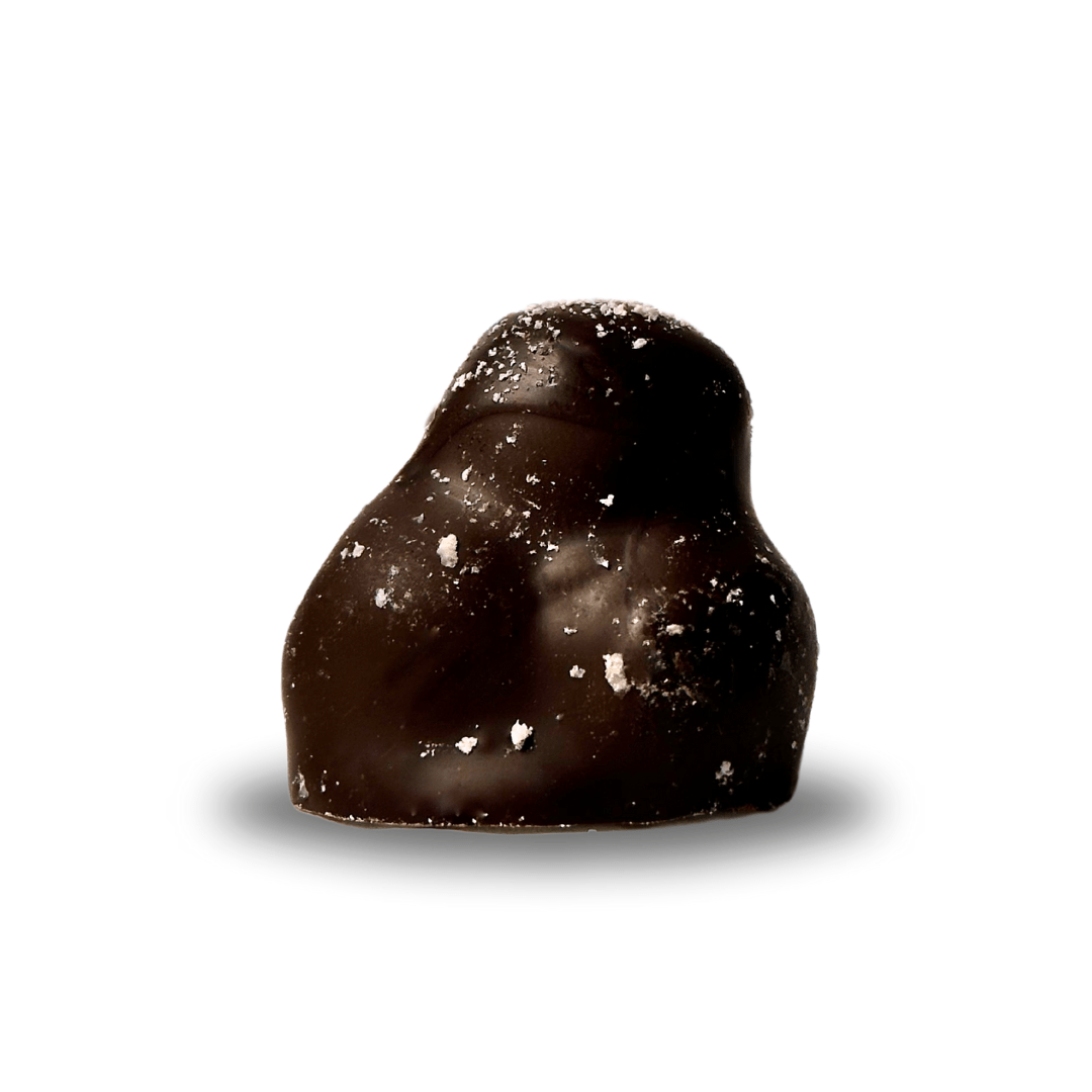 Zoryani candy with a whole hazelnut, honey and dark chocolate